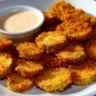 Crispy air fryer fried pickles on a plate ready to eat