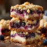 Deliciously baked Blueberry Cream Cheese Bars topped with fresh blueberries