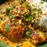 Delicious Coconut Lime Chicken garnished with cilantro and lime