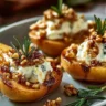 Elegant blue cheese stuffed pears garnished for a delicious appetizer.