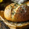 Garlic Parmesan Bread with fresh herbs, golden brown and deliciously aromatic