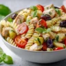 Mediterranean Chicken Pasta Salad with olives, tomatoes, and feta cheese