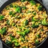 A bowl of quick ground turkey orzo with fresh vegetables and herbs.