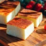 Delicious sugar-free yogurt cake topped with fresh berries and mint leaves
