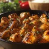 Delicious Texas Roadhouse Butter Chicken Skillet served in a cast iron pan