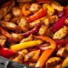 Delicious air fryer chicken fajitas with colorful bell peppers and onions