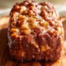 Freshly baked Amish apple fritter bread with chunks of apple and glaze