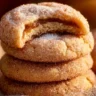 Delicious apple cider cheesecake cookies with a flaky texture and rich flavor.