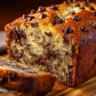 Delicious banana bread with chocolate chips on a wooden table
