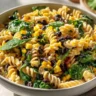Black Bean and Corn Pasta Salad with Lime Greek Yogurt Dressing served in a bowl.