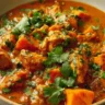 Delicious Chicken Sweet Potato Curry garnished with fresh herbs