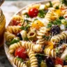Delicious homemade zesty Italian Pasta Salad in a colorful bowl