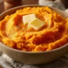 Creamy Honey Butter Mashed Sweet Potatoes served in a bowl