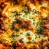 Delicious Million Dollar Lasagna with rich layers of cheese and sauce