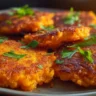 Healthy Sweet Potato Hash Browns served on a plate with herbs and spices